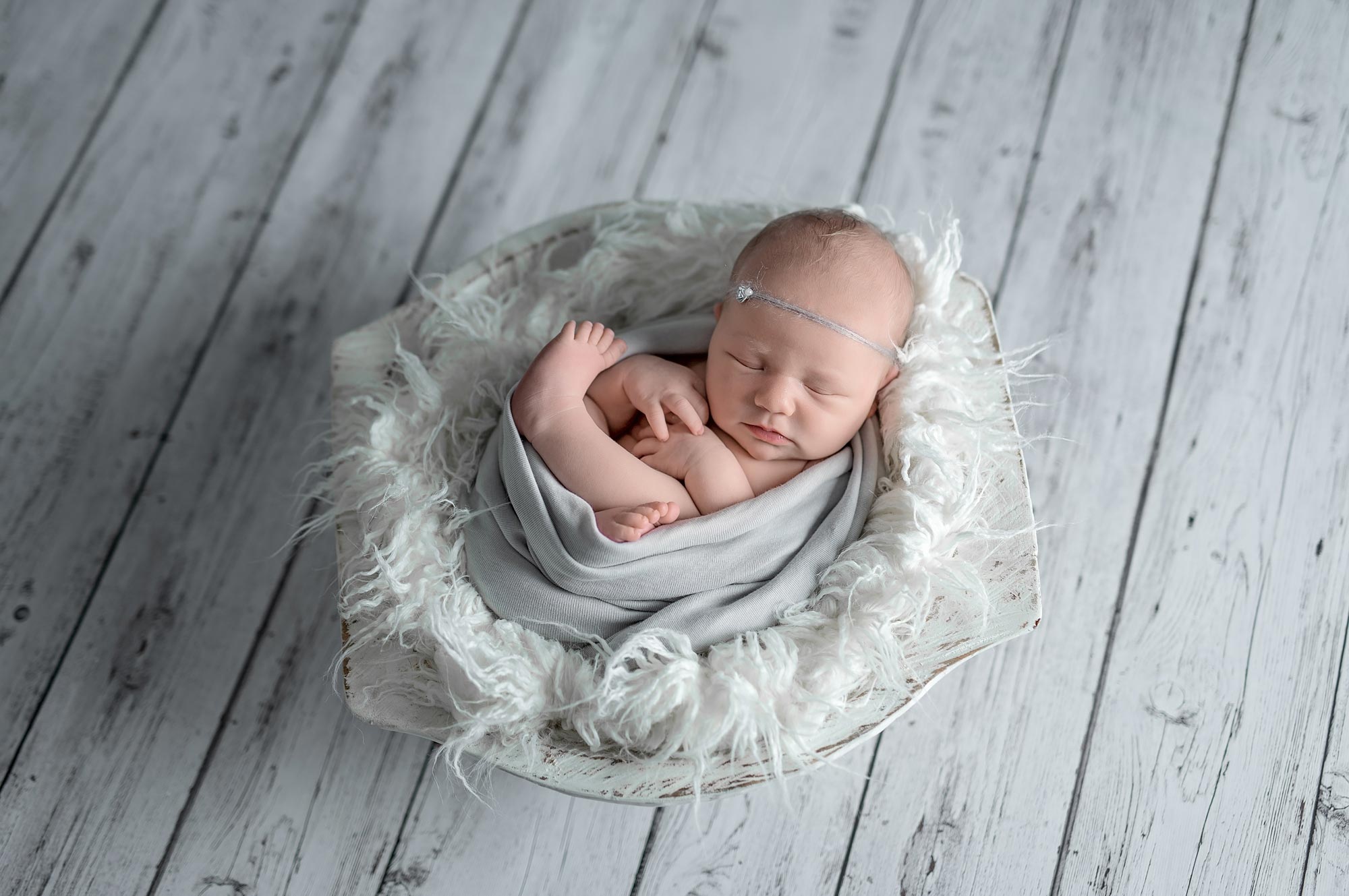 newborn photographer kanata wrapped baby