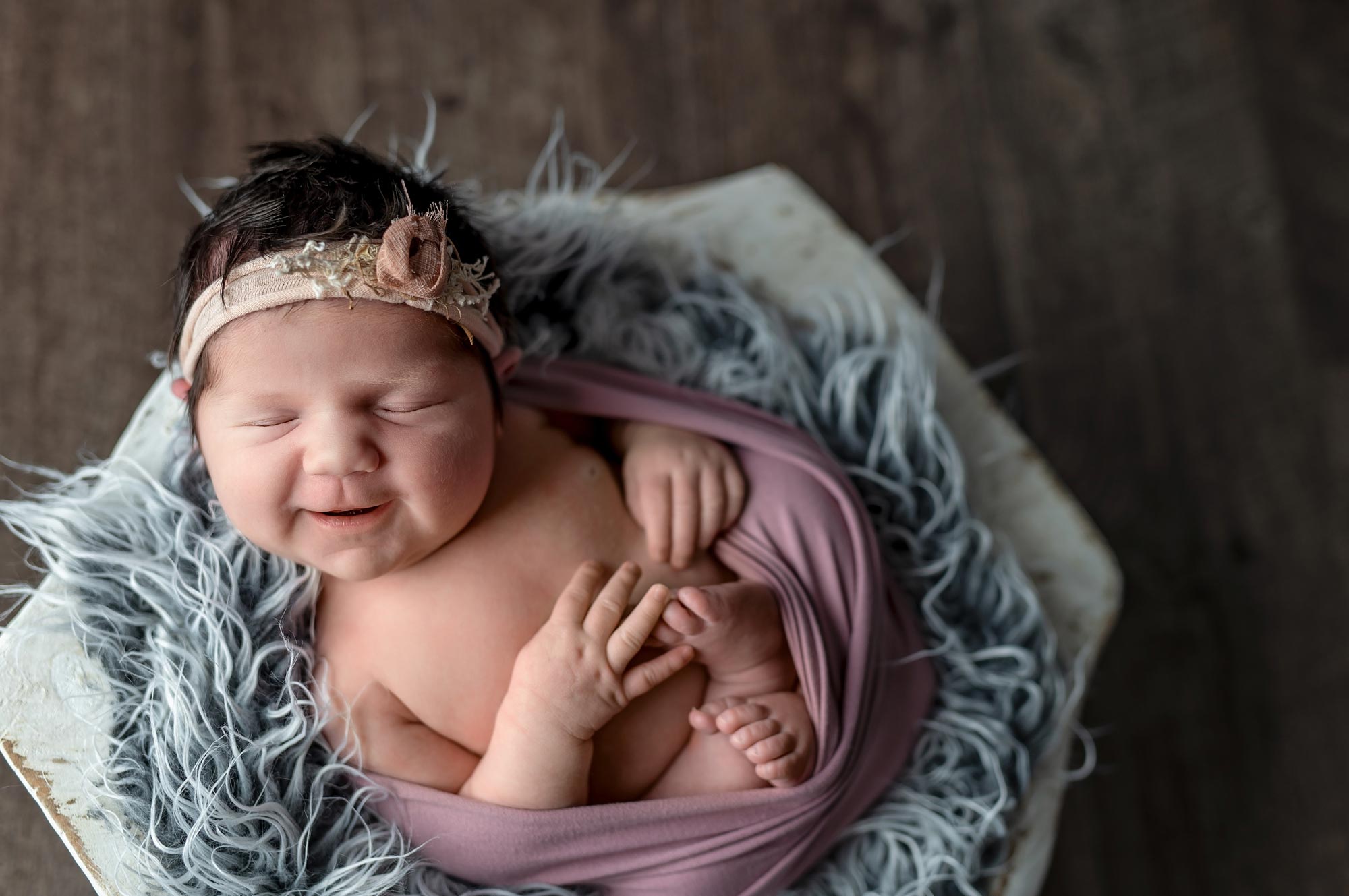newborn baby girl smiling in ottawa